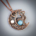 Aquamarine and moonstone cat necklace